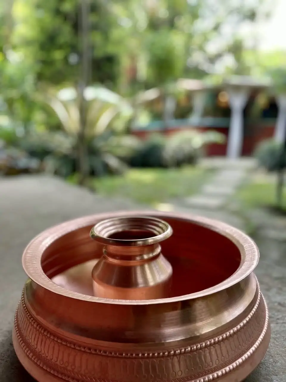 Copper foot bath prepared in the peaceful garden